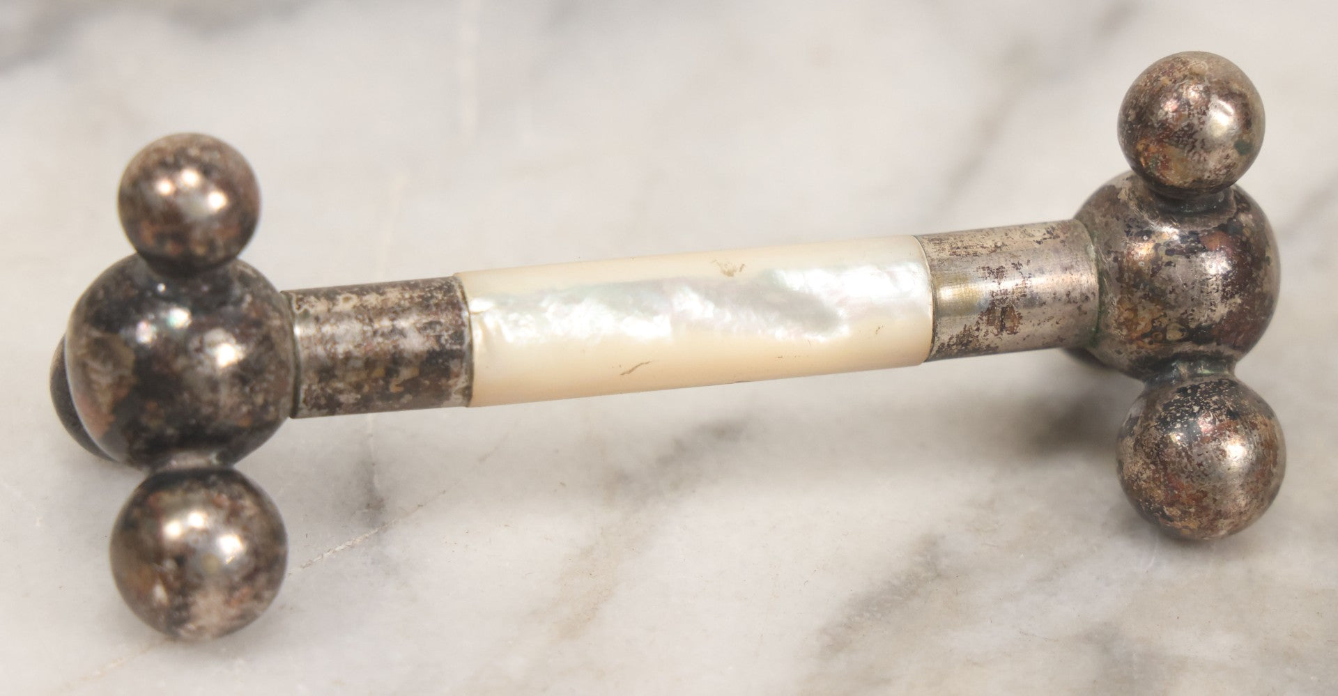 Lot 037 - Pair Of Antique Silverplate And Mother Of Pearl Knife Rests, 3-1/2" Long Each