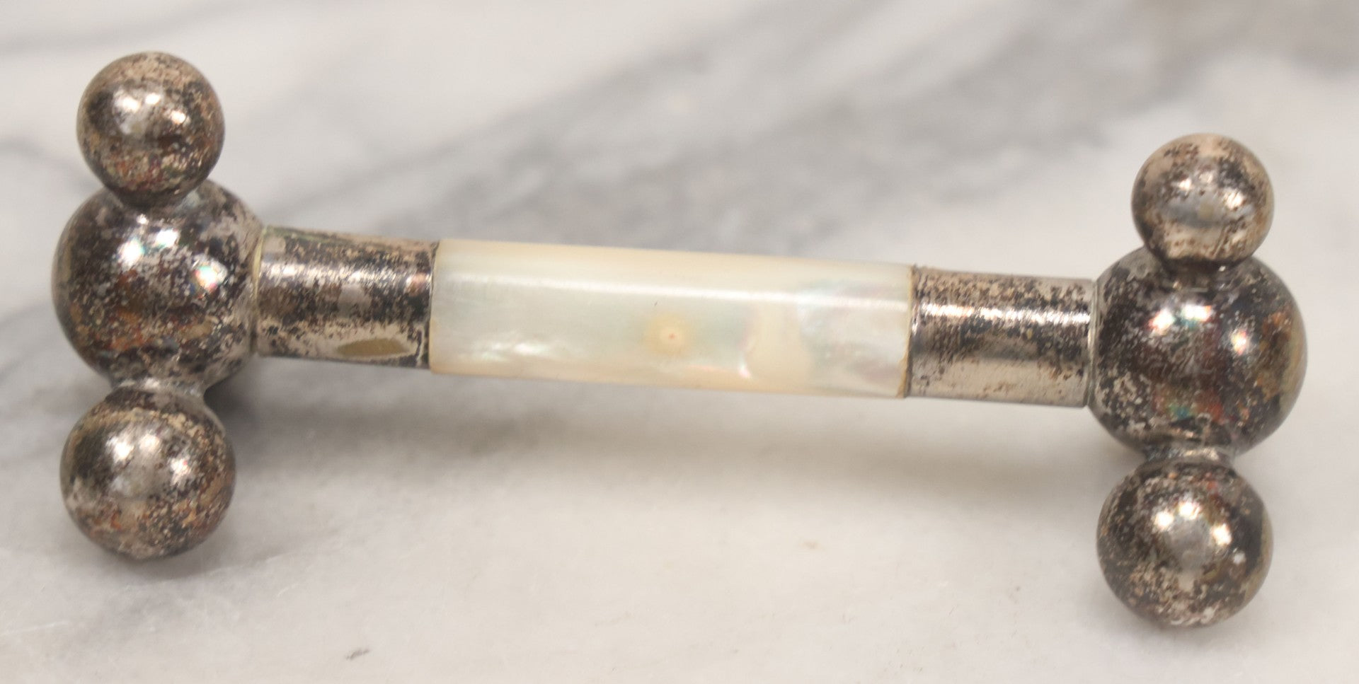 Lot 037 - Pair Of Antique Silverplate And Mother Of Pearl Knife Rests, 3-1/2" Long Each