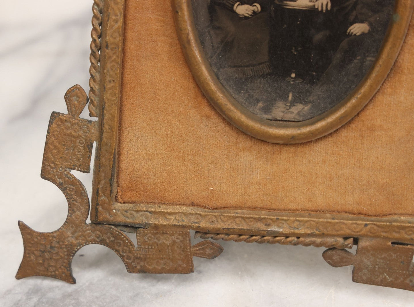 Lot 038 - Antique Cut Brass Frame Tintype Photo Frame With Orange Velvet Surround, Including Tintype Of Two Women And Man, As Found, With Wire Kick Stand, 5-5/8" x 7"
