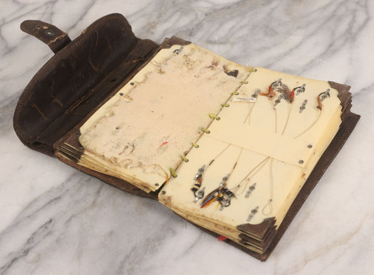 Lot 050 - Antique Leather Fly Fisherman's Wallet Book With Celluloid Pages, Many Fly Fishing Lures, Some Marked "Playfair's, Made In Scotland," Note Flies Have Varying Degrees Of Ware, Losses, As Found