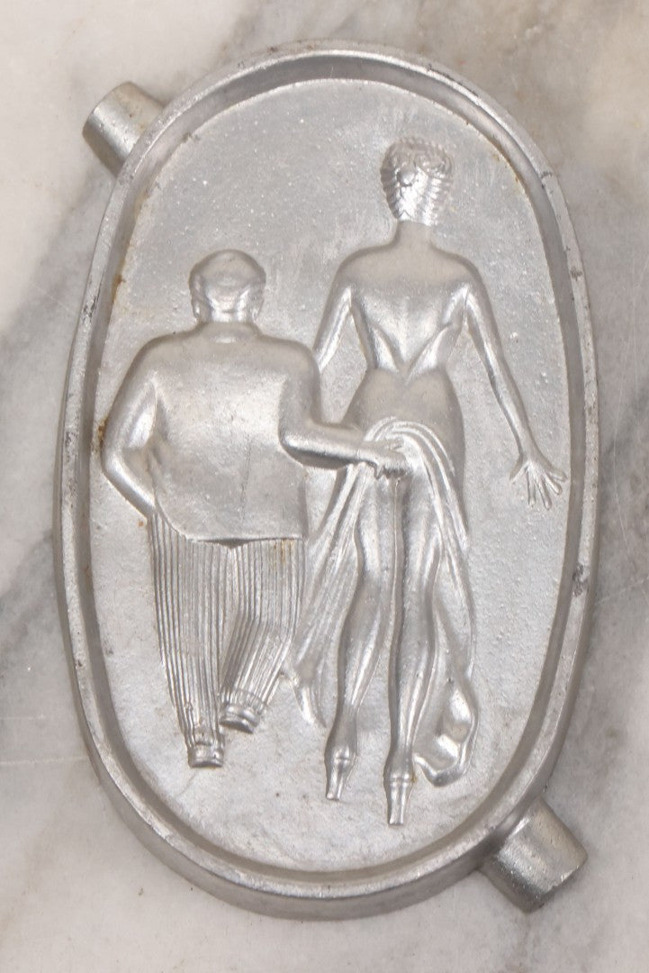 Lot 055 - Vintage Cast Aluminum "Oh! Ah!" Risqué Ashtray With Little Man Grabbing A Surprised Lady's Behind 