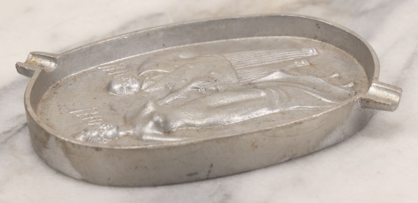 Lot 055 - Vintage Cast Aluminum "Oh! Ah!" Risqué Ashtray With Little Man Grabbing A Surprised Lady's Behind 