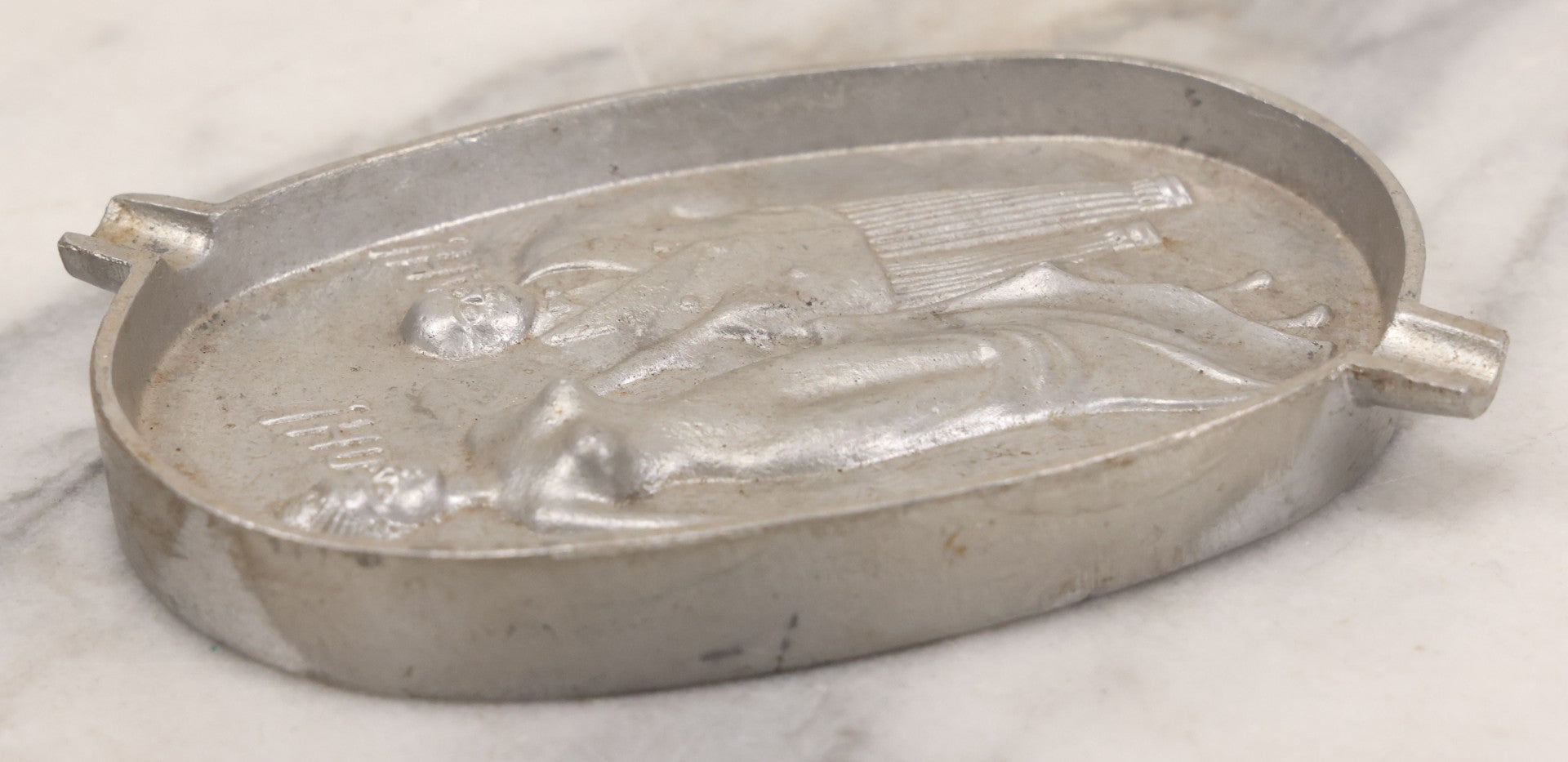 Lot 055 - Vintage Cast Aluminum "Oh! Ah!" Risqué Ashtray With Little Man Grabbing A Surprised Lady's Behind 