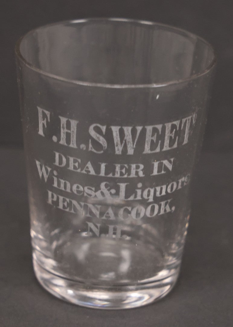 Lot 056 - Pair Of Vintage Glass Shot Glasses Advertising F.H. Sweet, Dealer In Wines & Liquors, Pennacook, New Hampshire