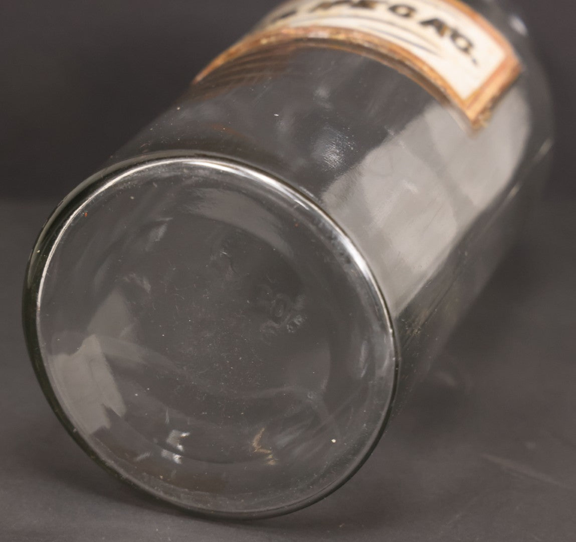 Lot 057 - Grouping Of Three Antique Glass Apothecary Bottles With Reverse Painted Glass Labels Including Syrup Of Ipecac (Syr. Ipecac.), Blackberry Wine (Vin. Rubi Vill.), And Port Wine (Vin. Oporto)
