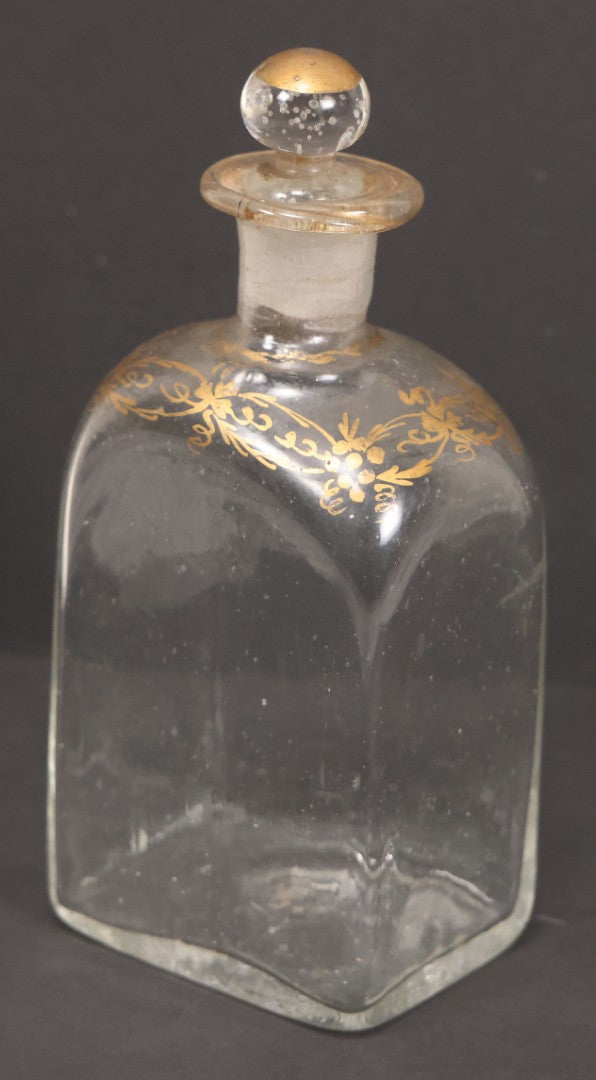 Lot 058 - Antique Hand Blown Glass Bottle With Stopper, Gold Paint Detailing, Pontil Mark