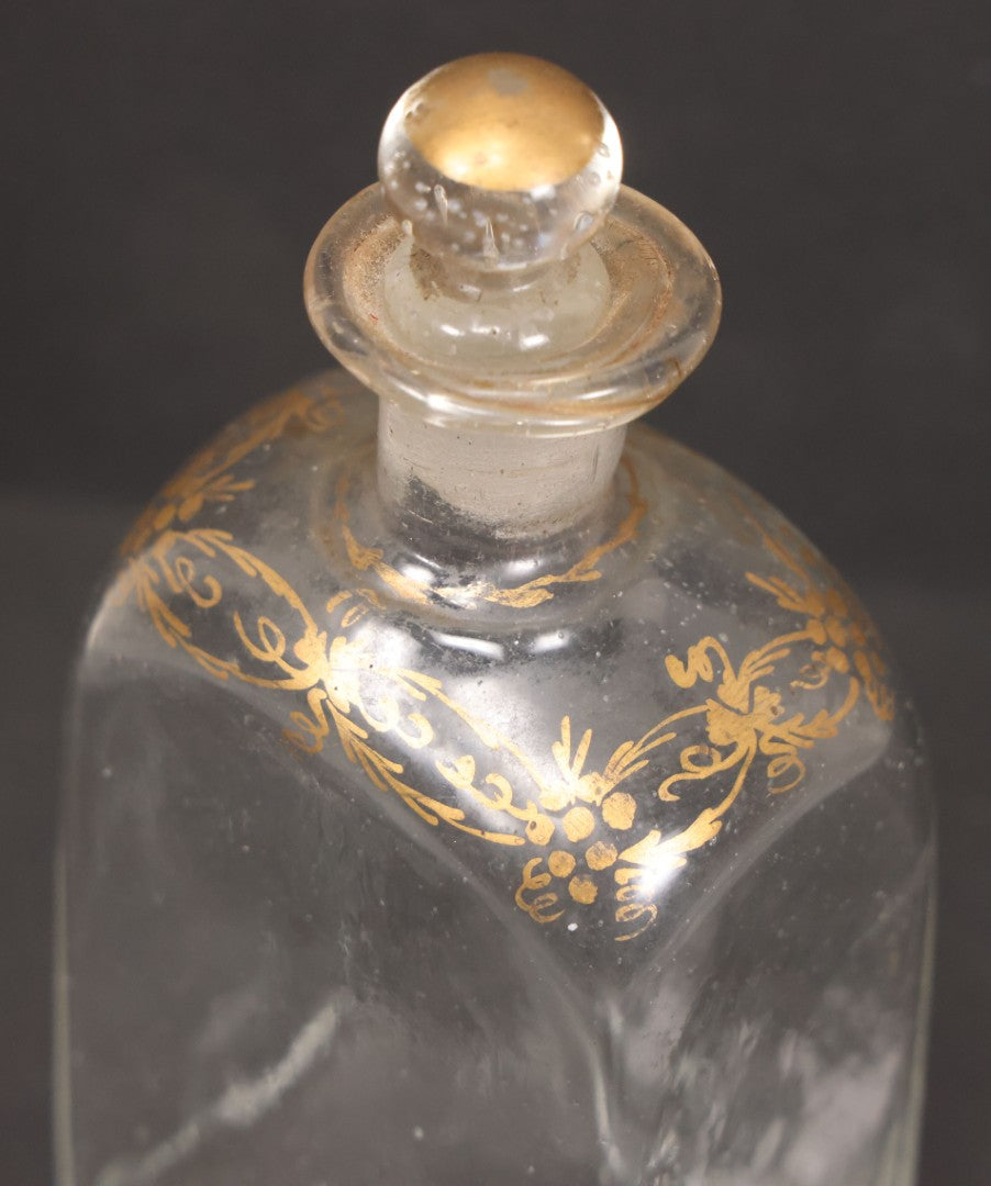 Lot 058 - Antique Hand Blown Glass Bottle With Stopper, Gold Paint Detailing, Pontil Mark