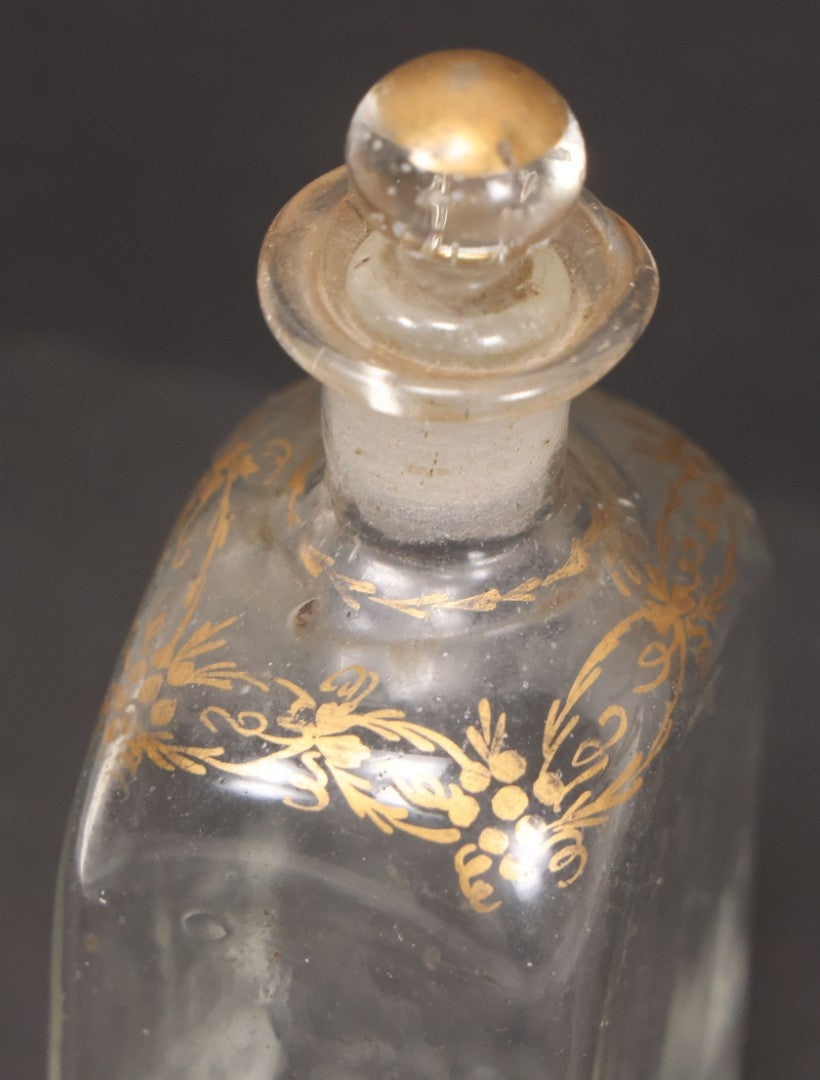 Lot 058 - Antique Hand Blown Glass Bottle With Stopper, Gold Paint Detailing, Pontil Mark