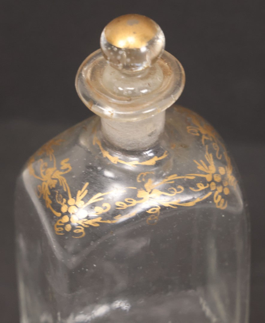 Lot 058 - Antique Hand Blown Glass Bottle With Stopper, Gold Paint Detailing, Pontil Mark