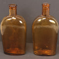 Lot 059 - Pair Of Antique Amber Glass Flask Bottles With Textured Glass