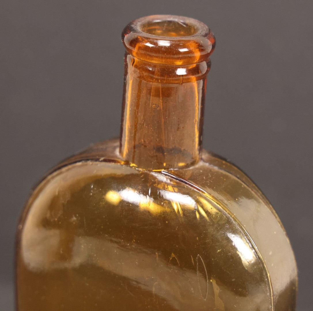 Lot 059 - Pair Of Antique Amber Glass Flask Bottles With Textured Glass