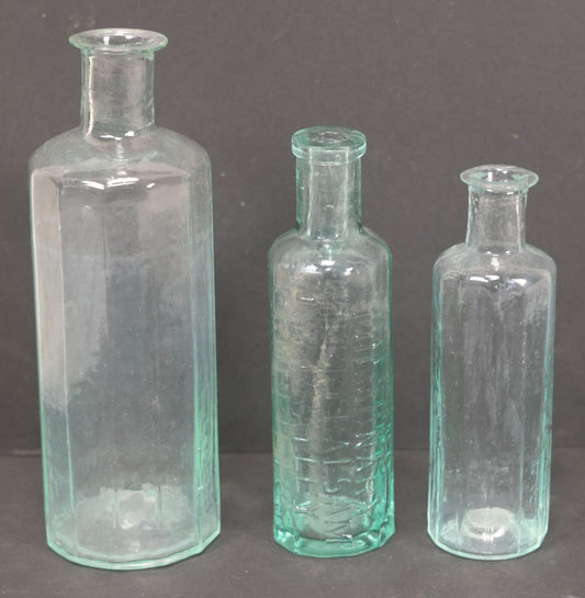 Lot 060 - Grouping Of Three Antique Apothecary Bottles Including Two Early Hand Blown Bottles With Pontil Marks, And Wilson's Pulmonary Cherry Balsam, Note Chips