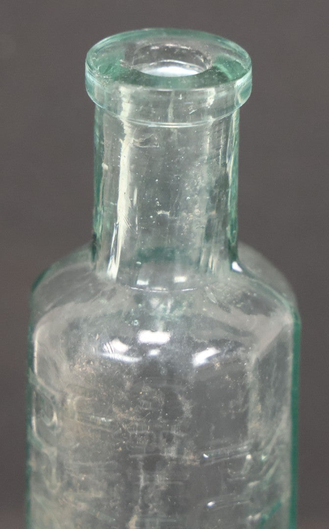 Lot 060 - Grouping Of Three Antique Apothecary Bottles Including Two Early Hand Blown Bottles With Pontil Marks, And Wilson's Pulmonary Cherry Balsam, Note Chips