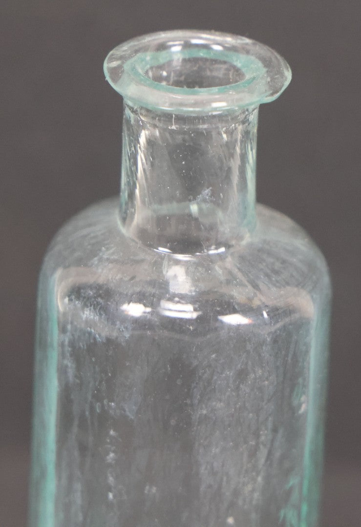 Lot 060 - Grouping Of Three Antique Apothecary Bottles Including Two Early Hand Blown Bottles With Pontil Marks, And Wilson's Pulmonary Cherry Balsam, Note Chips