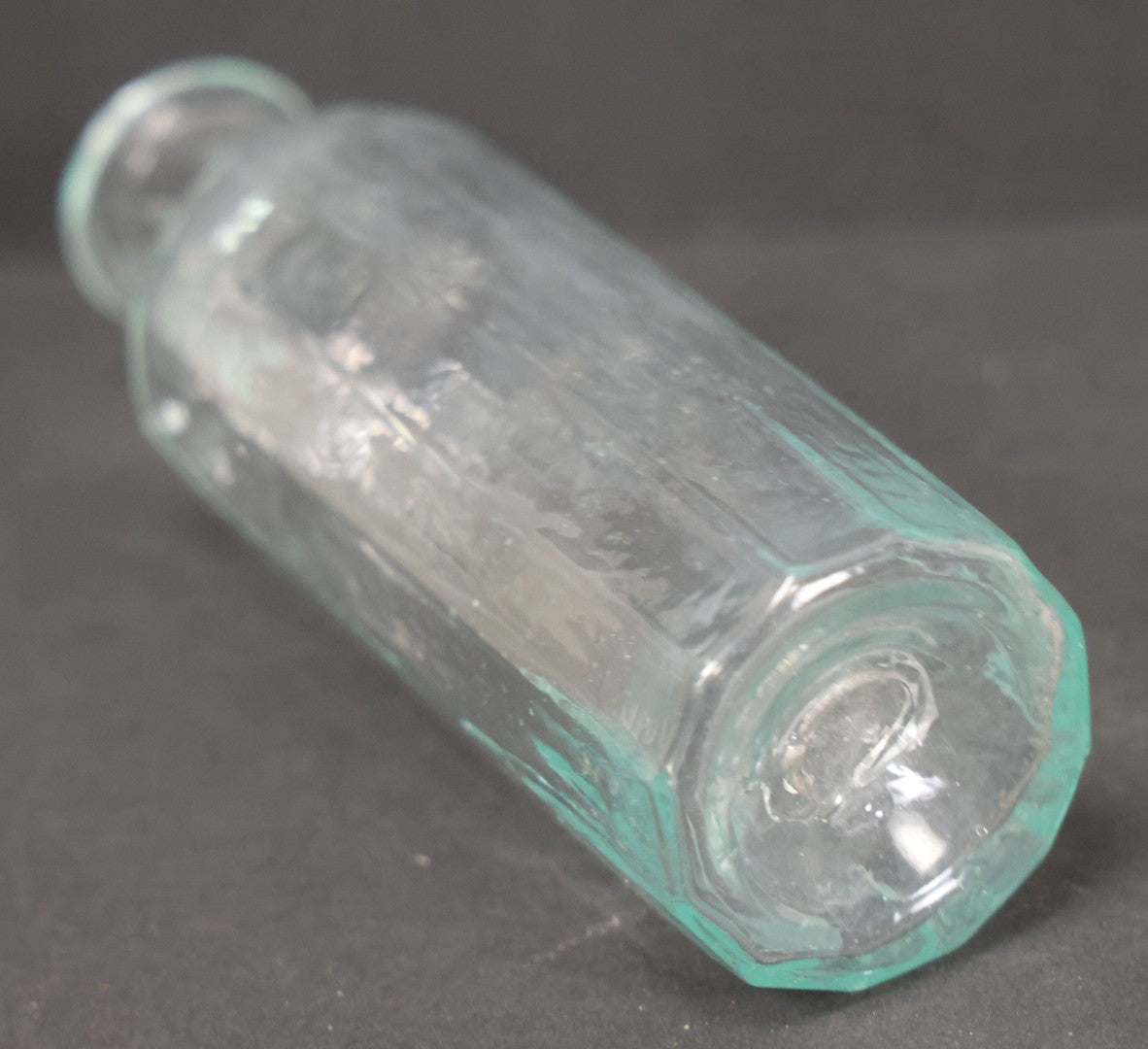 Lot 060 - Grouping Of Three Antique Apothecary Bottles Including Two Early Hand Blown Bottles With Pontil Marks, And Wilson's Pulmonary Cherry Balsam, Note Chips