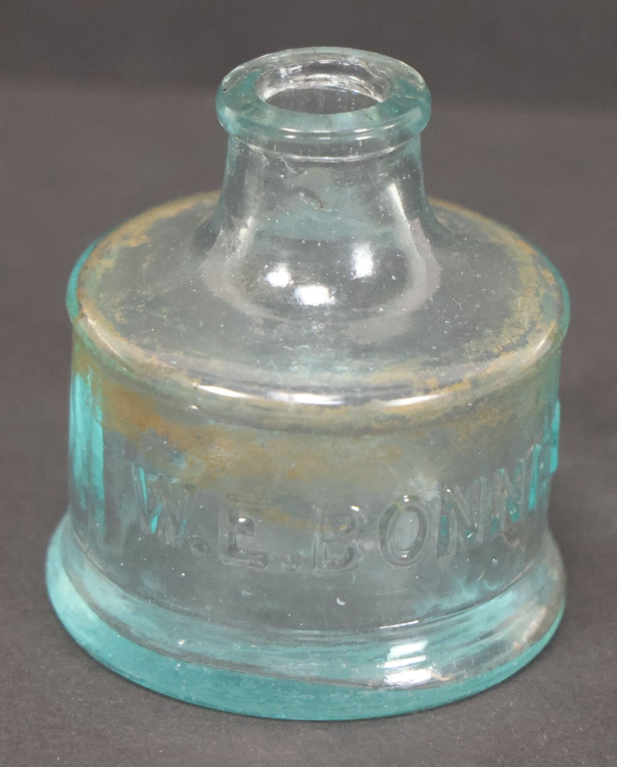 Lot 061 - Grouping Of Five Antique Glass Inkwell Bottles Including W.E. Bonney, Others, Note Chips