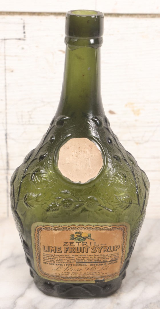 Lot 062 - Vintage Zetril Lime Fruit Syrup Green Glass Bottle With Original Paper Label, L. Rose & Co., Ltd., Lime And Fruit Growers, London And At Dominica B.W.I. (British West Indies), Bottled In London, 9-1/2" Height