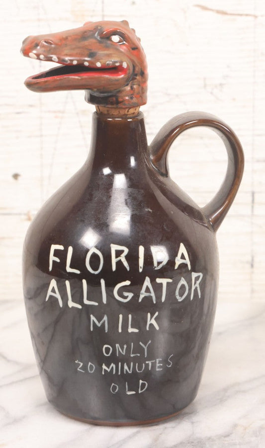 Lot 063 - Vintage Novelty Ceramic Florida Alligator Milk Decanter With Figural Alligator Spout Stopper, "Only 20 Minutes Old," 7-3/4" Height