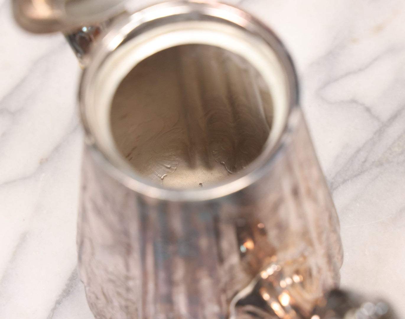 Lot 069 - Antique Embellished And Etched Silverplate Teapot With Hinged Lid And Handle With Bone Fittings, With Floral, Scroll And Pineapple Motifs, Engraved L.C. And W. R. M. 1916, 10-1/2" Height