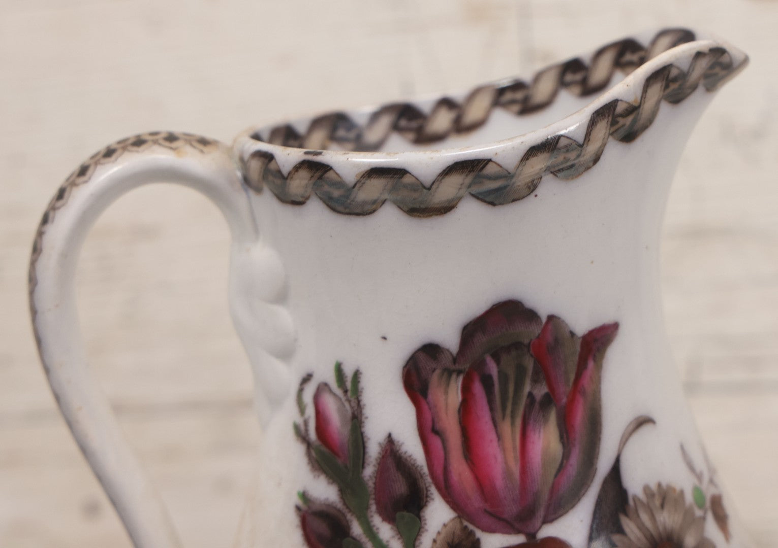 Lot 071 - Antique Painted Transferware Earthenware Pitcher With Floral Design, Marked "Flora" On Bottom, Manufactured By Charles Hobson, 7-1/4" Height