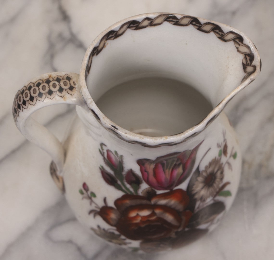 Lot 071 - Antique Painted Transferware Earthenware Pitcher With Floral Design, Marked "Flora" On Bottom, Manufactured By Charles Hobson, 7-1/4" Height
