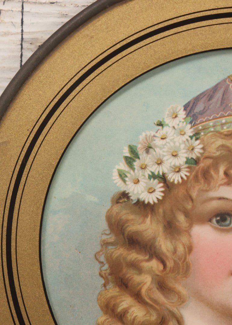 Lot 079 - Antique Chromolithograph Print Of Little Blonde Girl With Flowers In Her Hair, In Circular Reverse Painted Glass Frame, 7-7/8" Diameter