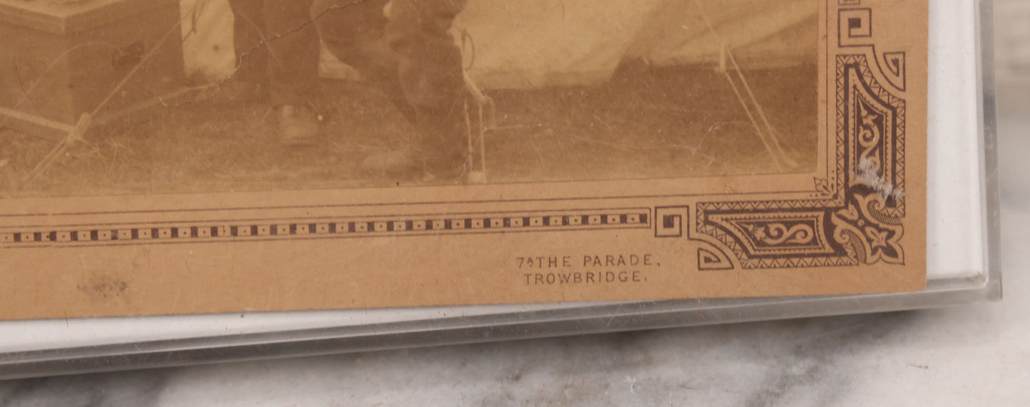 Lot 083 - Antique Boarded Photograph Of Soldier's Shaving Tent With Men Posing With Rifles, Barber, Implements And Tools, Photo By J.W. Culverhouse, " 7A The Parade, Trowbridge" Wiltshire, England, Note Photo Damaged, Losses