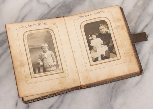 Lot 086 - Antique Family Photo Album With Mostly Trimmed Real Photo Postcards R.P.P.C., Snapshots, And Other Photos, With 26 Photos In All, Including Girl With Doll, Soldier, Woman With Dog, And Others, Most Identified