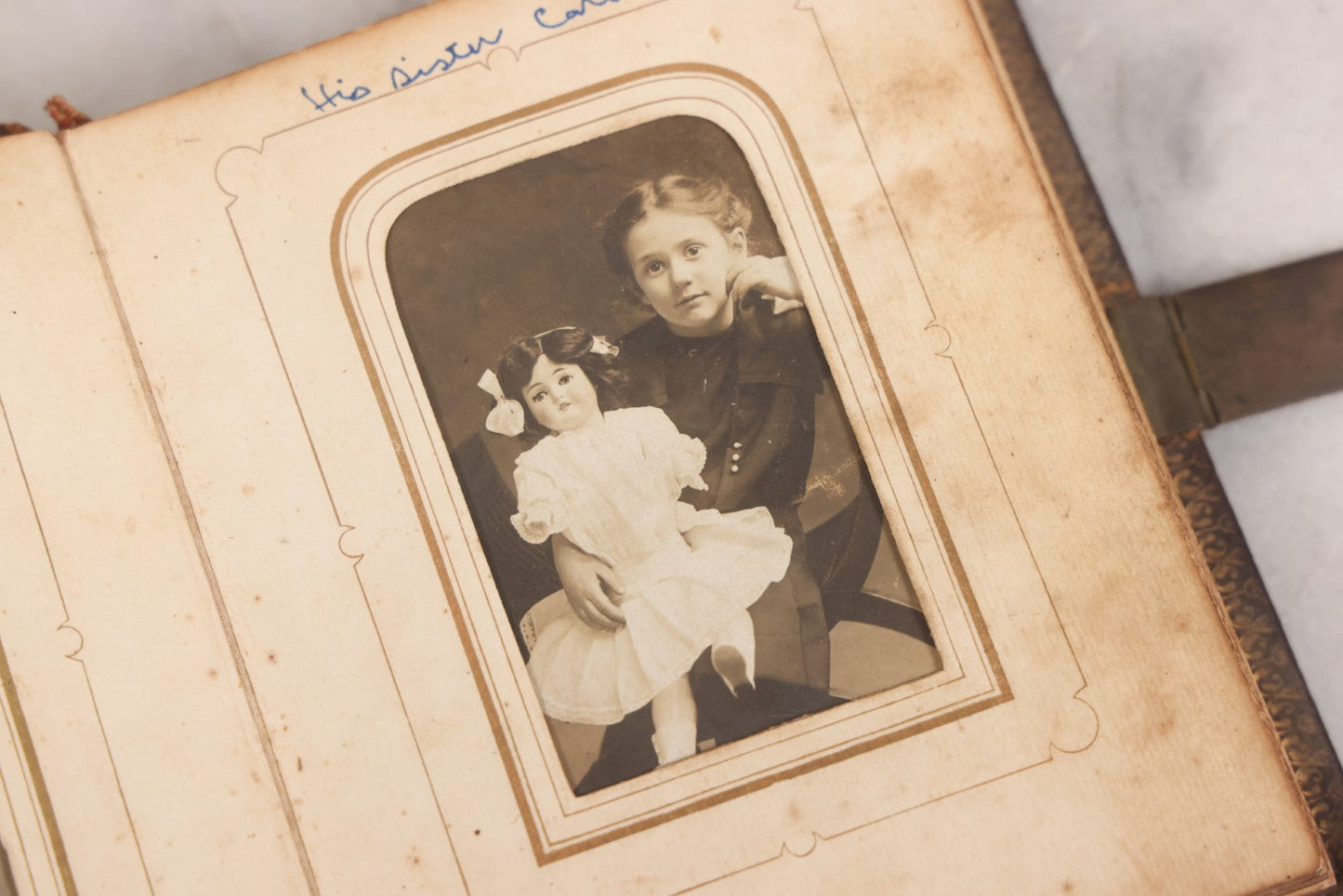 Lot 086 - Antique Family Photo Album With Mostly Trimmed Real Photo Postcards R.P.P.C., Snapshots, And Other Photos, With 26 Photos In All, Including Girl With Doll, Soldier, Woman With Dog, And Others, Most Identified
