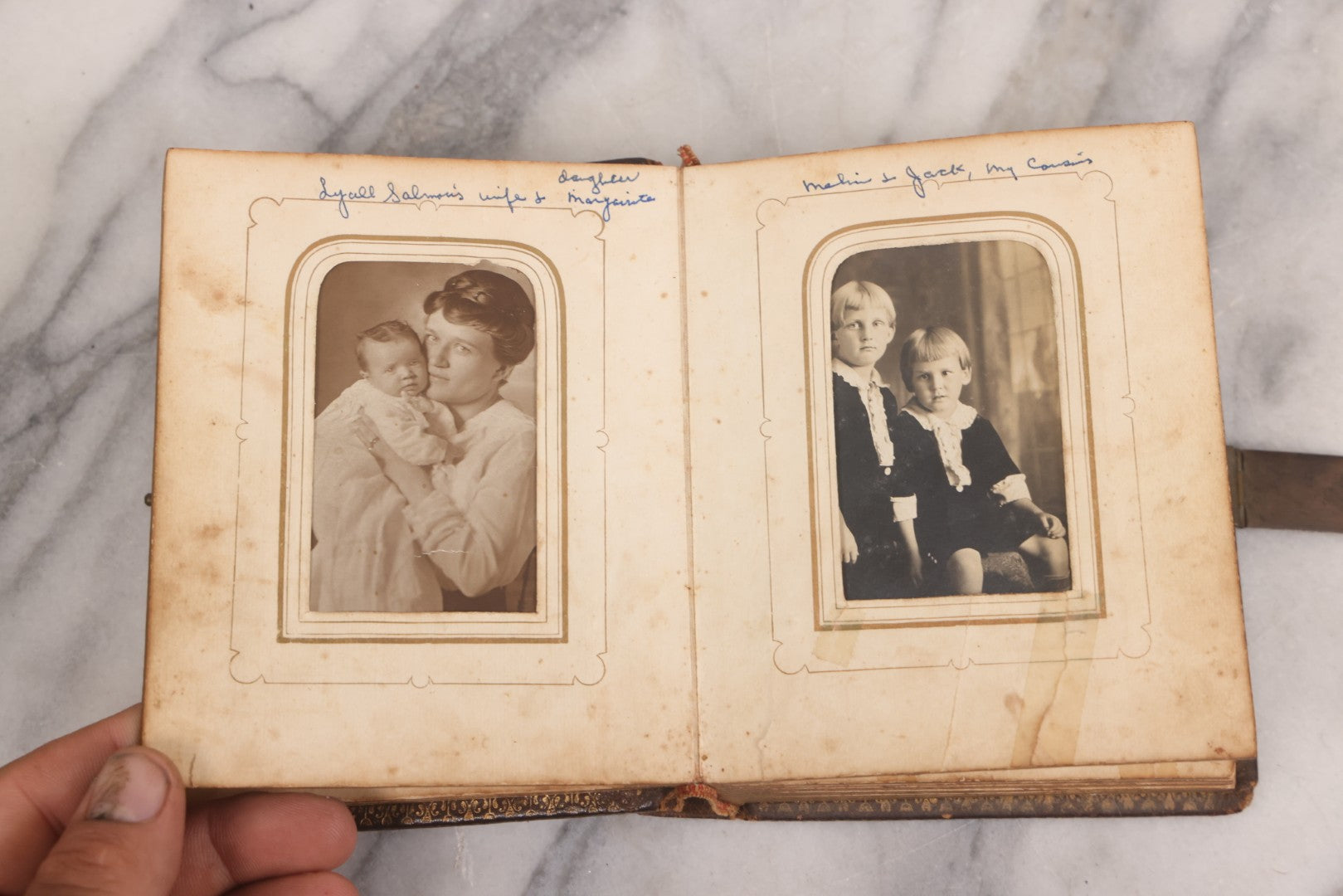 Lot 086 - Antique Family Photo Album With Mostly Trimmed Real Photo Postcards R.P.P.C., Snapshots, And Other Photos, With 26 Photos In All, Including Girl With Doll, Soldier, Woman With Dog, And Others, Most Identified