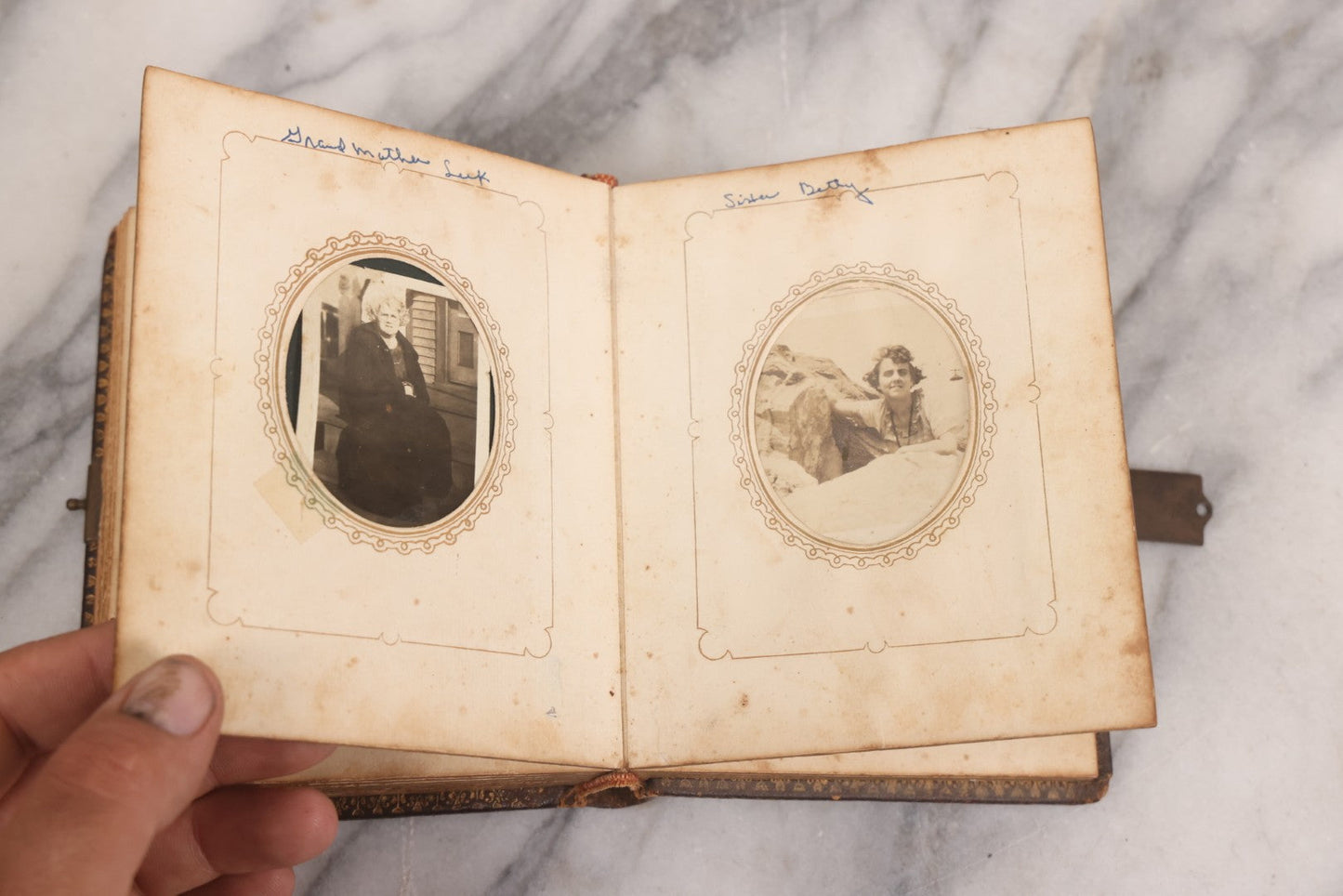 Lot 086 - Antique Family Photo Album With Mostly Trimmed Real Photo Postcards R.P.P.C., Snapshots, And Other Photos, With 26 Photos In All, Including Girl With Doll, Soldier, Woman With Dog, And Others, Most Identified