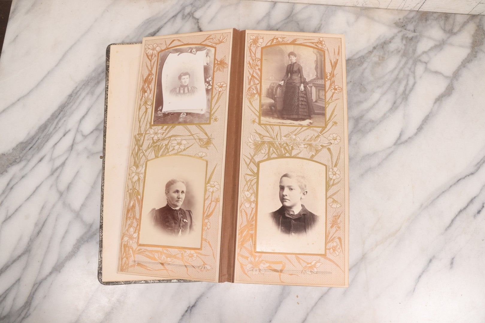 Lot 087 - Antique Cabinet Card Photo Album With Pressed Metal Cover, Floral Design, Raised Decorative Metal Album Lettering, Red Fabric Back Cover, Containing 58 Cabinet Card Photos Including Boy with Bicycle, Knights Templar, and Woman in Mourning