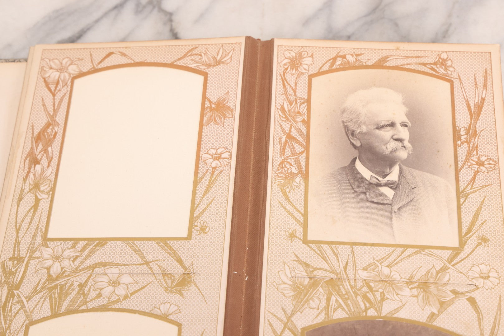 Lot 087 - Antique Cabinet Card Photo Album With Pressed Metal Cover, Floral Design, Raised Decorative Metal Album Lettering, Red Fabric Back Cover, Containing 58 Cabinet Card Photos Including Boy with Bicycle, Knights Templar, and Woman in Mourning