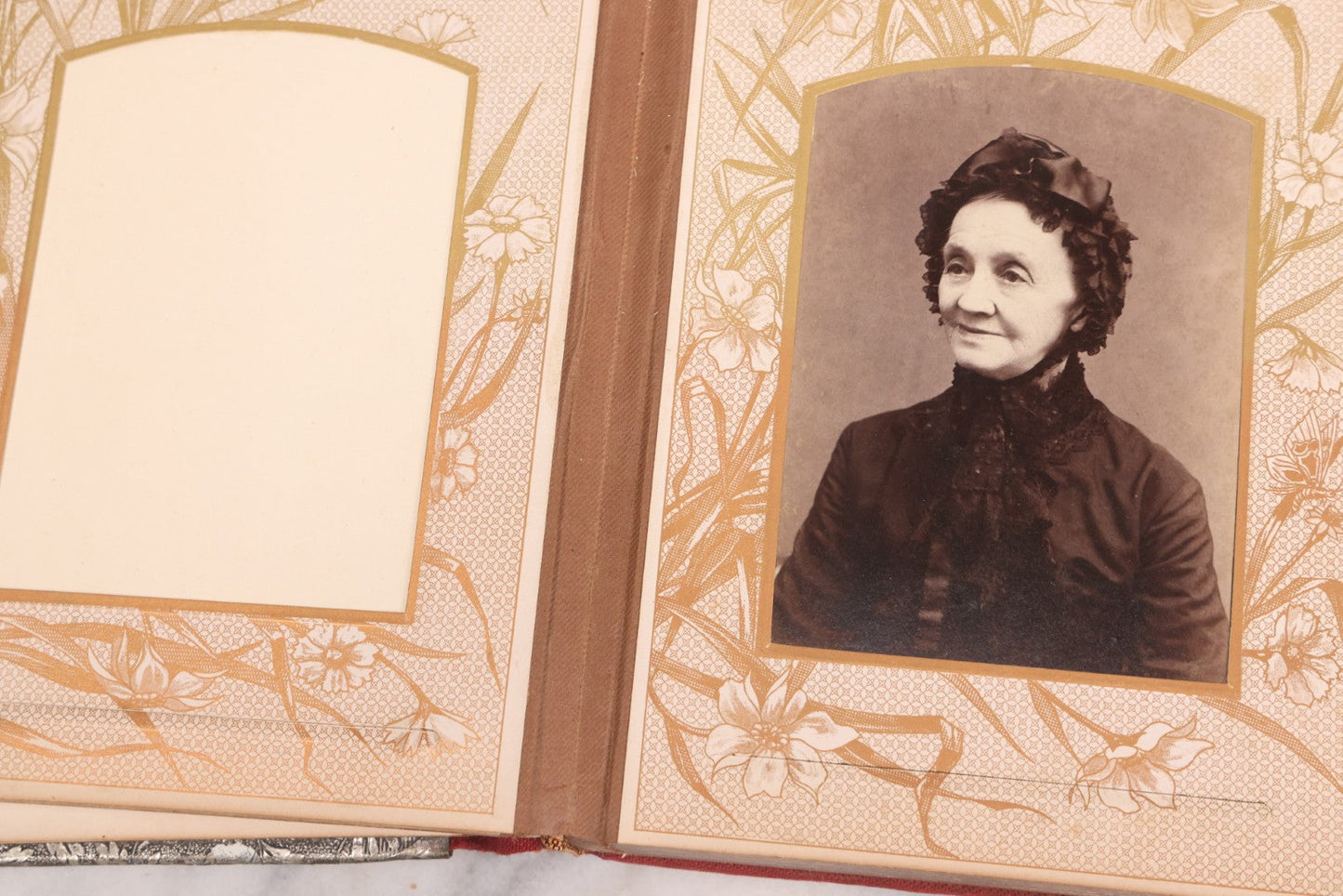 Lot 087 - Antique Cabinet Card Photo Album With Pressed Metal Cover, Floral Design, Raised Decorative Metal Album Lettering, Red Fabric Back Cover, Containing 58 Cabinet Card Photos Including Boy with Bicycle, Knights Templar, and Woman in Mourning
