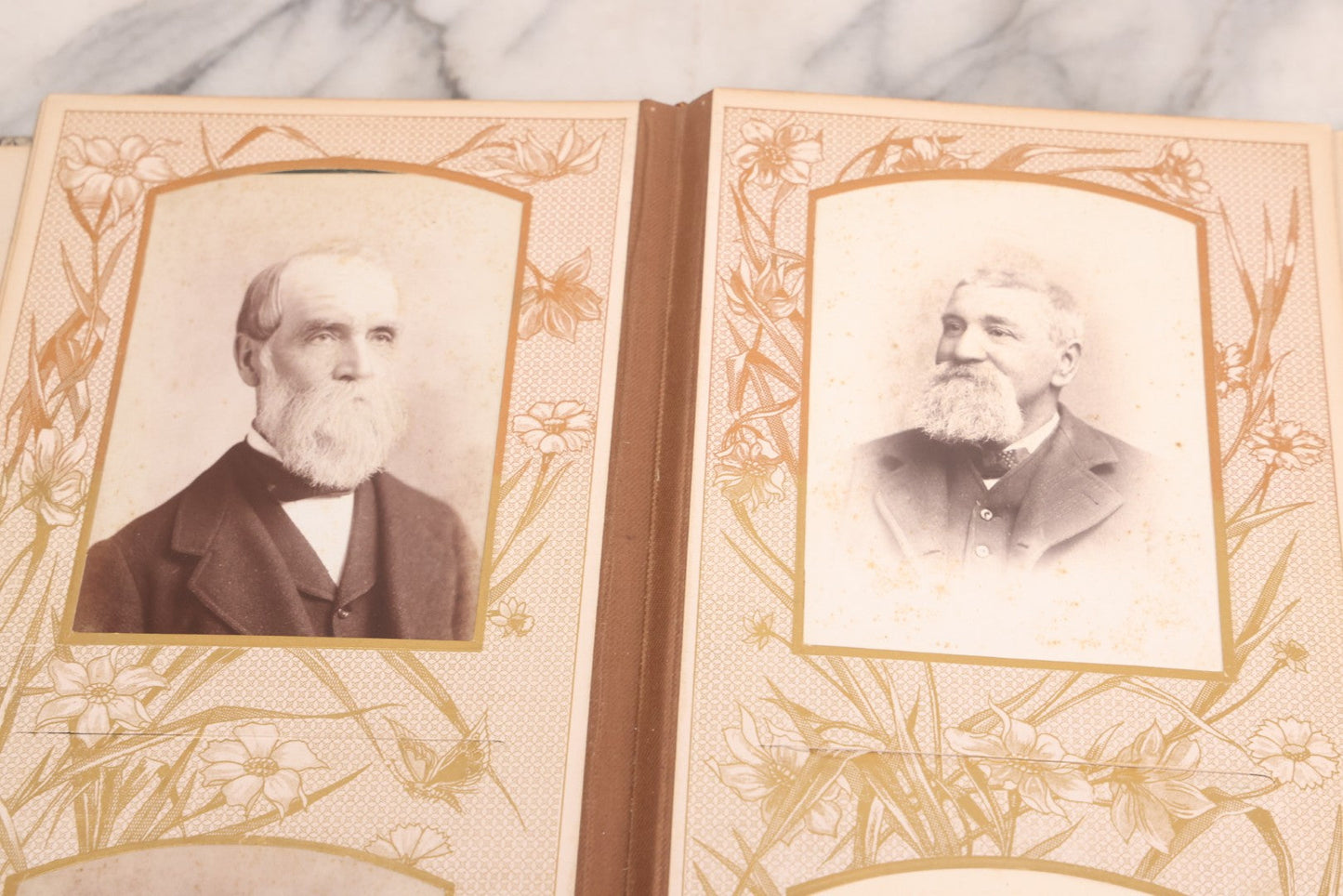 Lot 087 - Antique Cabinet Card Photo Album With Pressed Metal Cover, Floral Design, Raised Decorative Metal Album Lettering, Red Fabric Back Cover, Containing 58 Cabinet Card Photos Including Boy with Bicycle, Knights Templar, and Woman in Mourning