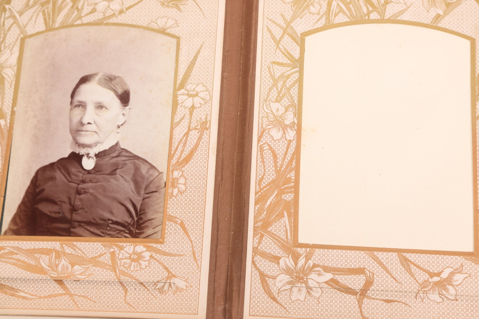 Lot 087 - Antique Cabinet Card Photo Album With Pressed Metal Cover, Floral Design, Raised Decorative Metal Album Lettering, Red Fabric Back Cover, Containing 58 Cabinet Card Photos Including Boy with Bicycle, Knights Templar, and Woman in Mourning