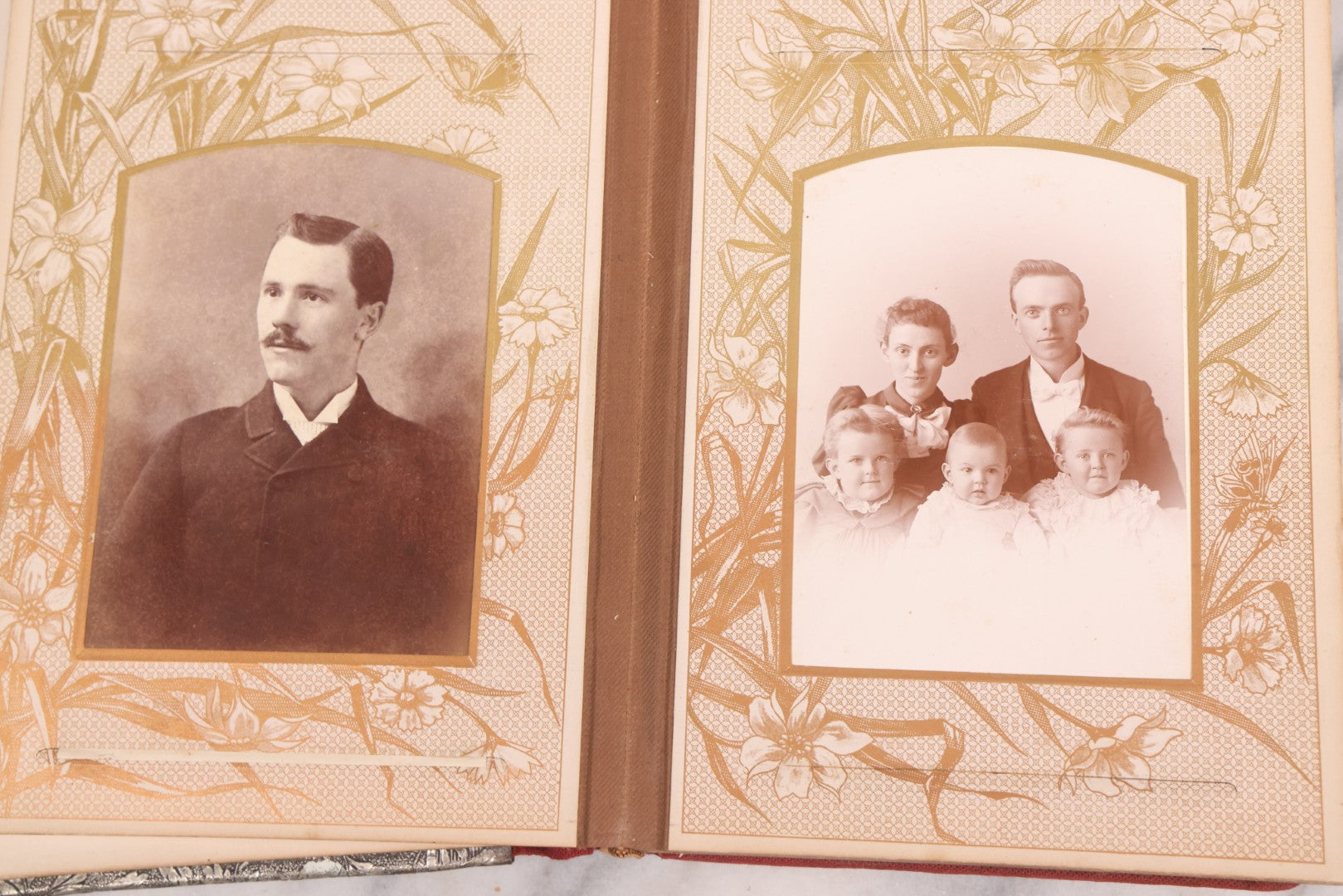 Lot 087 - Antique Cabinet Card Photo Album With Pressed Metal Cover, Floral Design, Raised Decorative Metal Album Lettering, Red Fabric Back Cover, Containing 58 Cabinet Card Photos Including Boy with Bicycle, Knights Templar, and Woman in Mourning