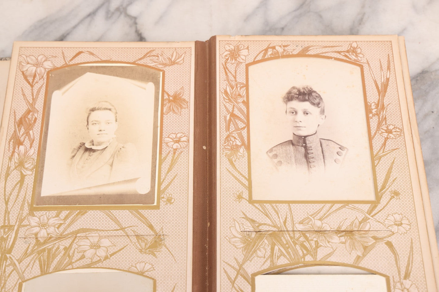 Lot 087 - Antique Cabinet Card Photo Album With Pressed Metal Cover, Floral Design, Raised Decorative Metal Album Lettering, Red Fabric Back Cover, Containing 58 Cabinet Card Photos Including Boy with Bicycle, Knights Templar, and Woman in Mourning