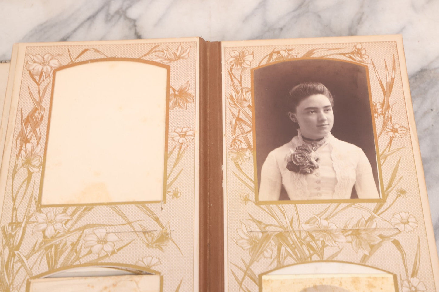 Lot 087 - Antique Cabinet Card Photo Album With Pressed Metal Cover, Floral Design, Raised Decorative Metal Album Lettering, Red Fabric Back Cover, Containing 58 Cabinet Card Photos Including Boy with Bicycle, Knights Templar, and Woman in Mourning