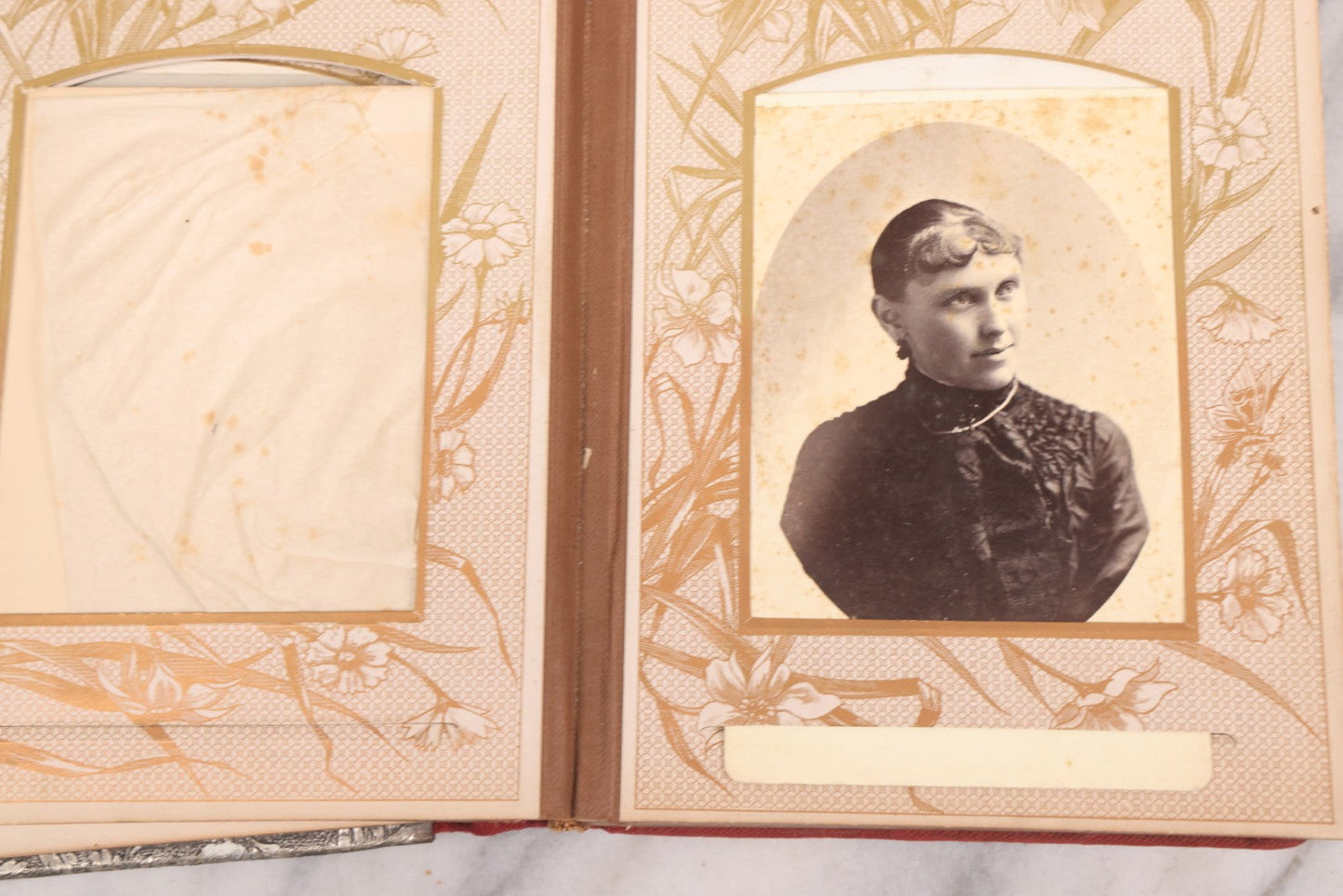 Lot 087 - Antique Cabinet Card Photo Album With Pressed Metal Cover, Floral Design, Raised Decorative Metal Album Lettering, Red Fabric Back Cover, Containing 58 Cabinet Card Photos Including Boy with Bicycle, Knights Templar, and Woman in Mourning