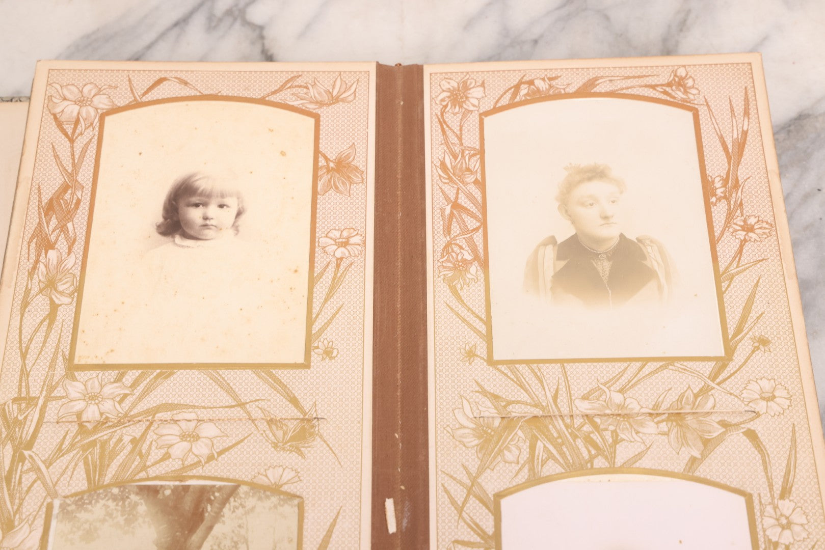 Lot 087 - Antique Cabinet Card Photo Album With Pressed Metal Cover, Floral Design, Raised Decorative Metal Album Lettering, Red Fabric Back Cover, Containing 58 Cabinet Card Photos Including Boy with Bicycle, Knights Templar, and Woman in Mourning