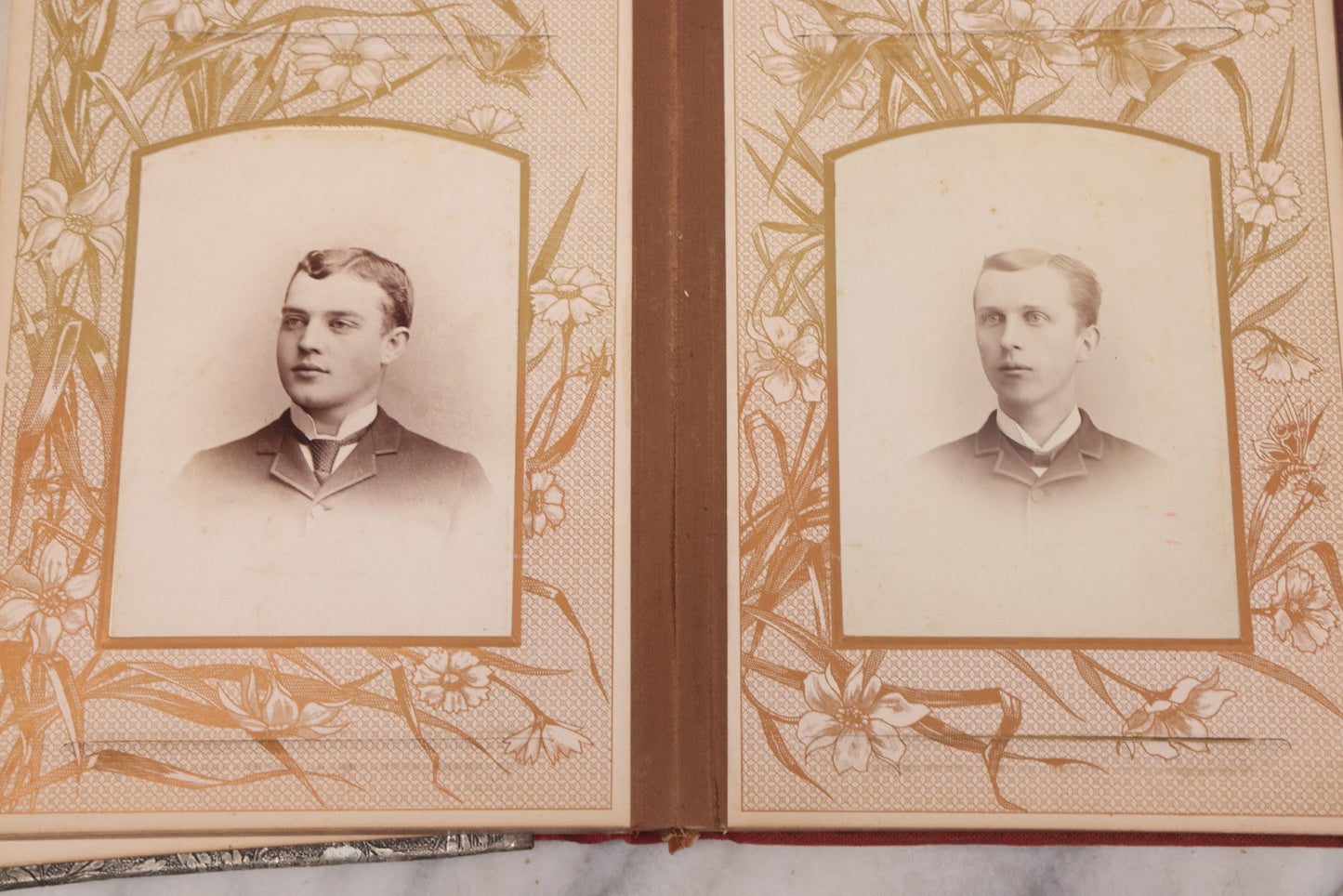 Lot 087 - Antique Cabinet Card Photo Album With Pressed Metal Cover, Floral Design, Raised Decorative Metal Album Lettering, Red Fabric Back Cover, Containing 58 Cabinet Card Photos Including Boy with Bicycle, Knights Templar, and Woman in Mourning