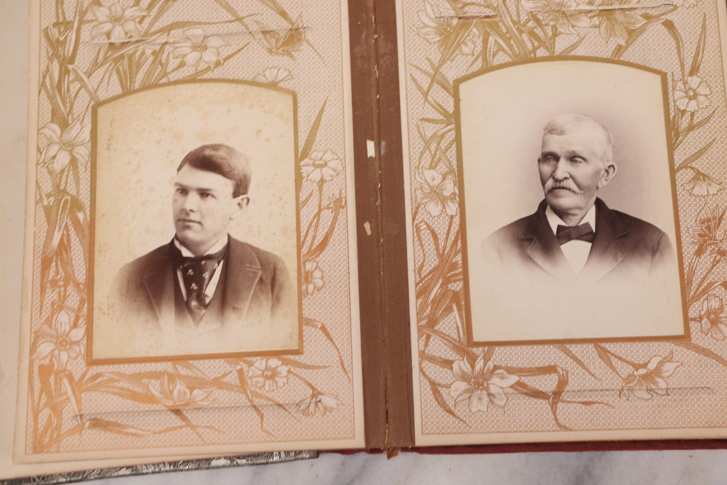 Lot 087 - Antique Cabinet Card Photo Album With Pressed Metal Cover, Floral Design, Raised Decorative Metal Album Lettering, Red Fabric Back Cover, Containing 58 Cabinet Card Photos Including Boy with Bicycle, Knights Templar, and Woman in Mourning