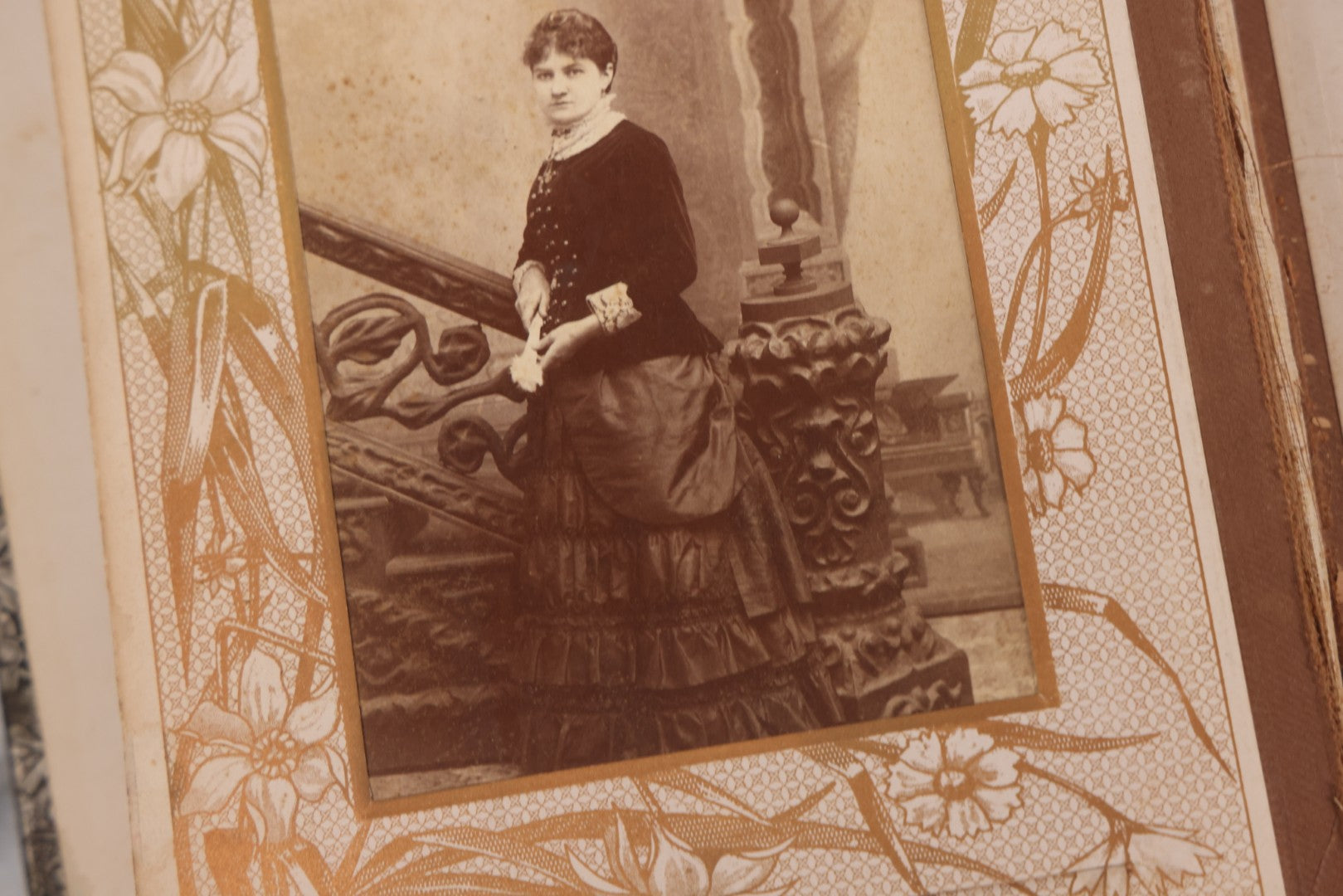 Lot 087 - Antique Cabinet Card Photo Album With Pressed Metal Cover, Floral Design, Raised Decorative Metal Album Lettering, Red Fabric Back Cover, Containing 58 Cabinet Card Photos Including Boy with Bicycle, Knights Templar, and Woman in Mourning