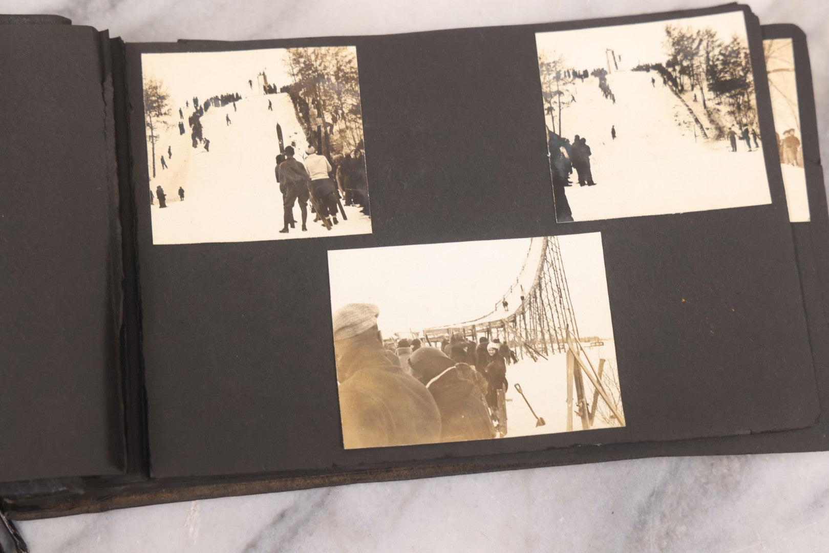 Lot 088 - Vintage Snapshot Photo Album Containing 16 Trimmed Photos Including Photos Of Giant Ski Jump And Mountain Cabin