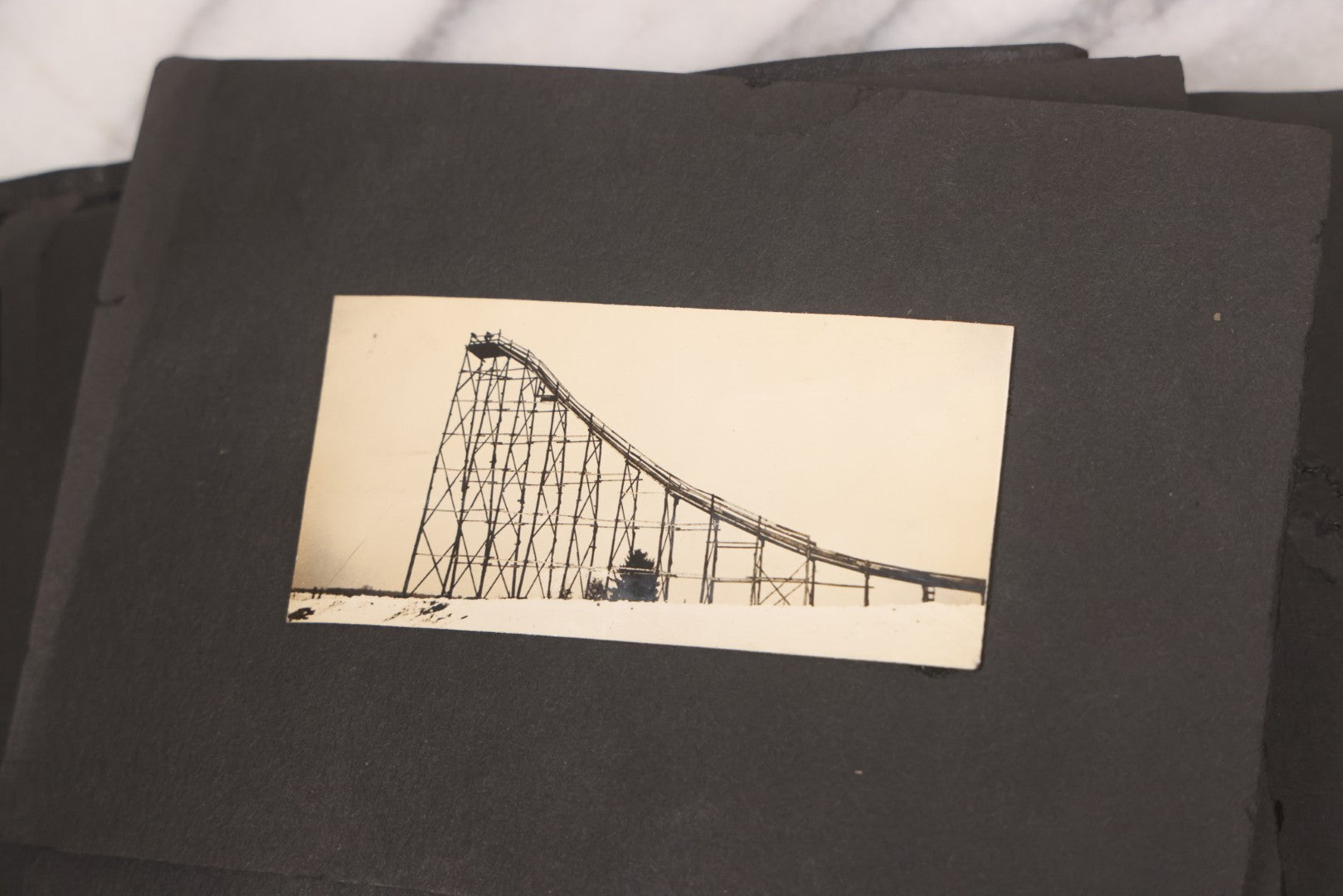 Lot 088 - Vintage Snapshot Photo Album Containing 16 Trimmed Photos Including Photos Of Giant Ski Jump And Mountain Cabin
