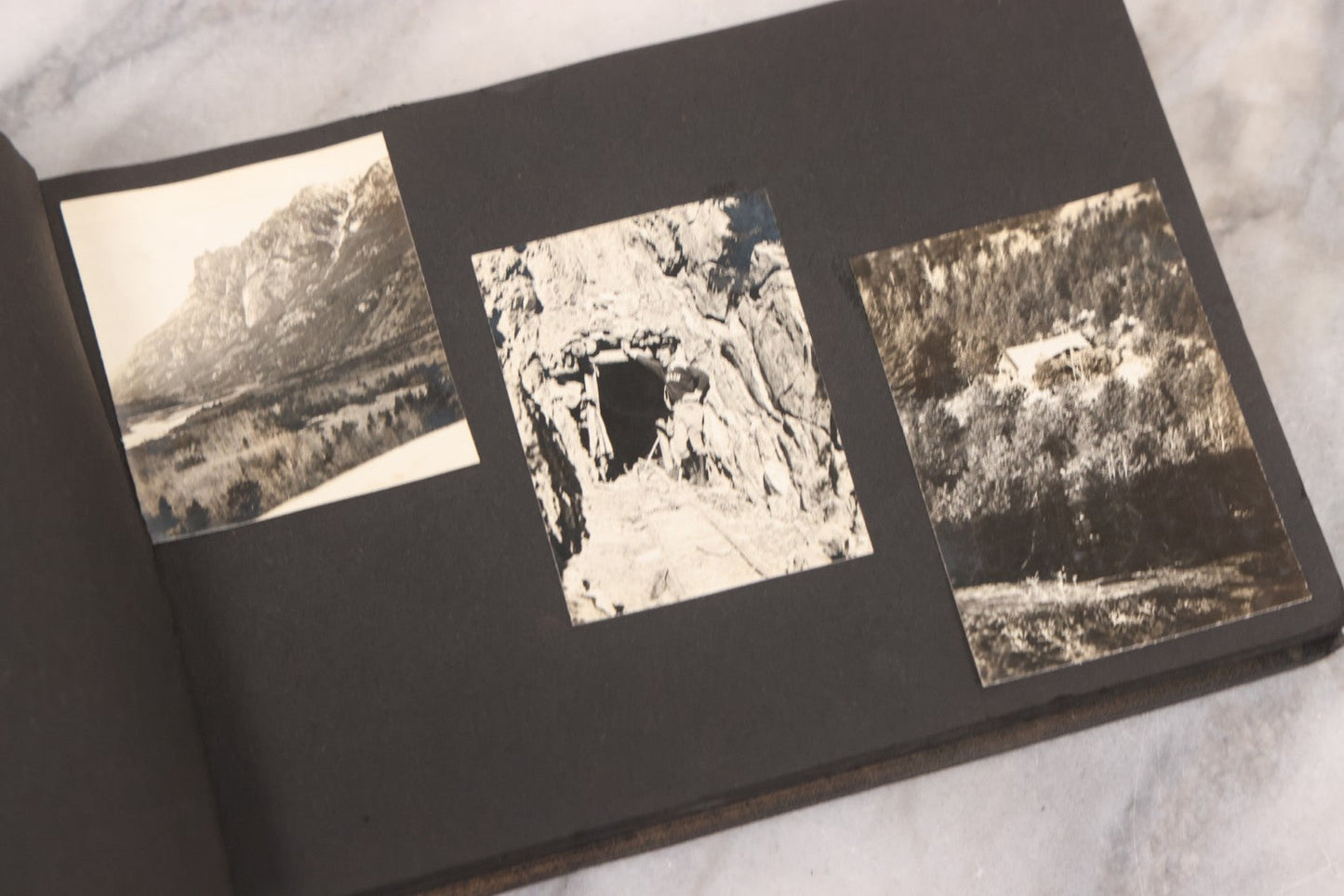 Lot 088 - Vintage Snapshot Photo Album Containing 16 Trimmed Photos Including Photos Of Giant Ski Jump And Mountain Cabin