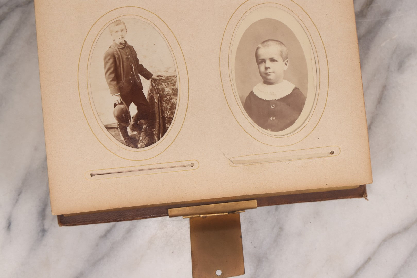 Lot 089 - Antique Leather Cabinet Card Photo Album With Engraved Metal Clasp "Bertha", Containing 6 Cabinet Card And 67 Carte De Visite C.D.V. Photos