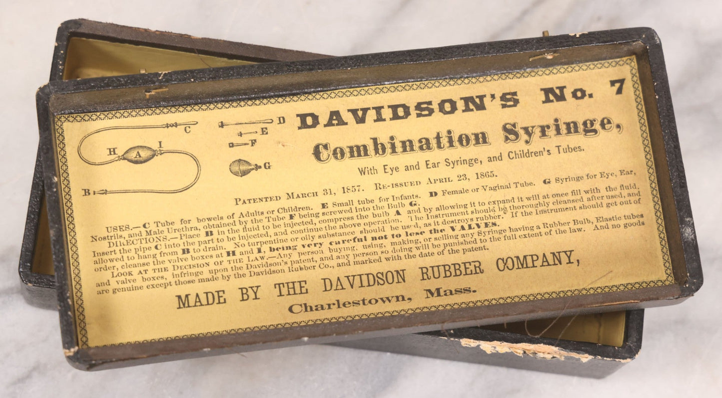 Lot 097 - Antique Medical Syringe Box For Davidson's No. 7 Combination Syringe, With Paper Label On Interior Lid, Patented 1857, Re-Issued 1865, Made By The Davidson Rubber Company, Charlestown, Massachusetts, Note Empty, Cover Detached