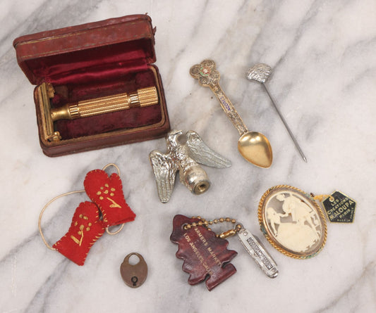 Lot 100 - Vintage Eight Piece Mixed Smalls Grouping Including Metal Eagle Finial, Gillette Razor In Case, Hollywood Farmers Market Pocket Knife With Keychain, Miniature Mittens, Plastic French Cameo Brooch, And More